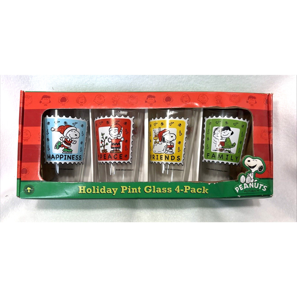 Peanuts Holiday Pint Glasses 4 piece Set Snoopy Charlie Brown Lucy Christmas